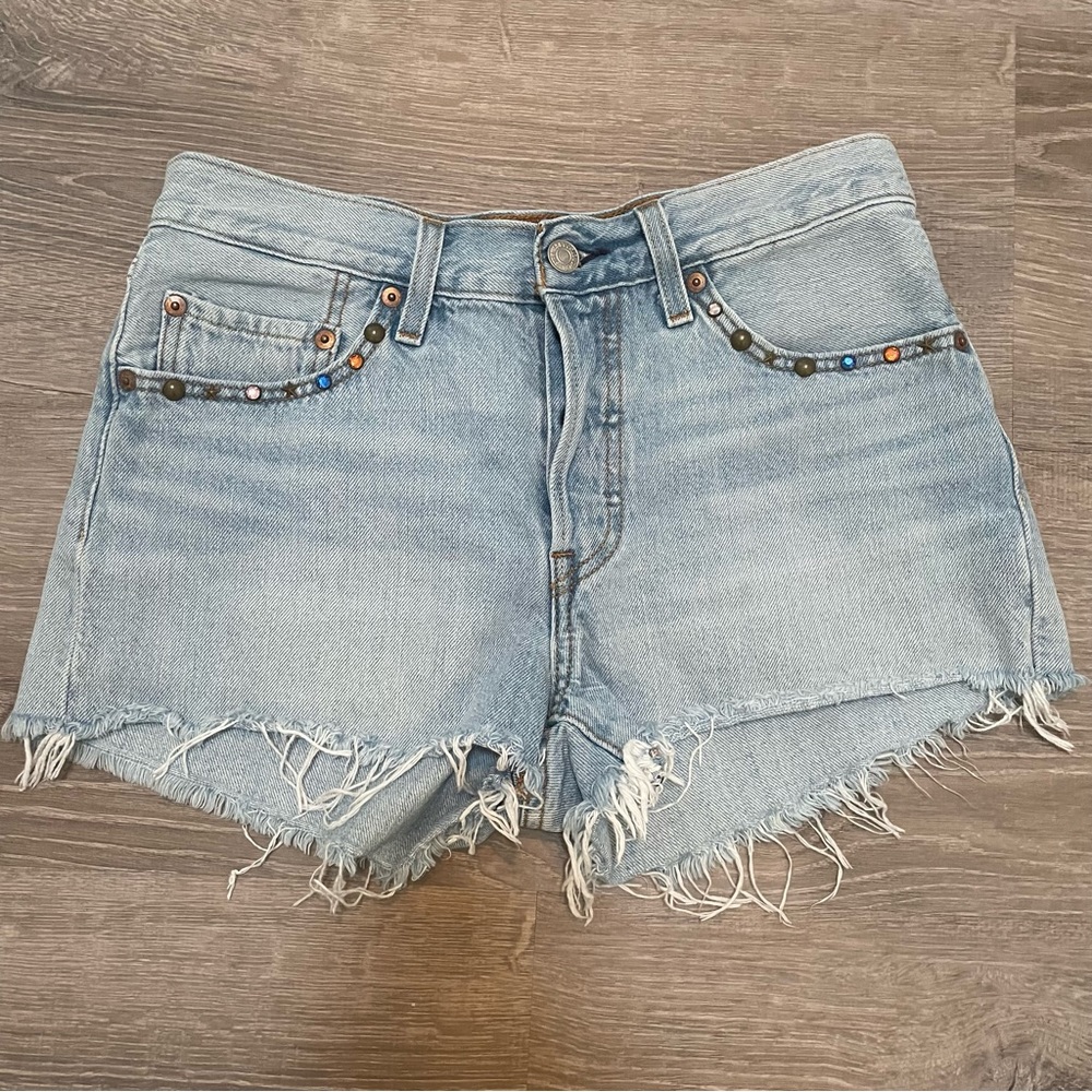 Levi’s 501 embellished light wash denim shorts. Size 26